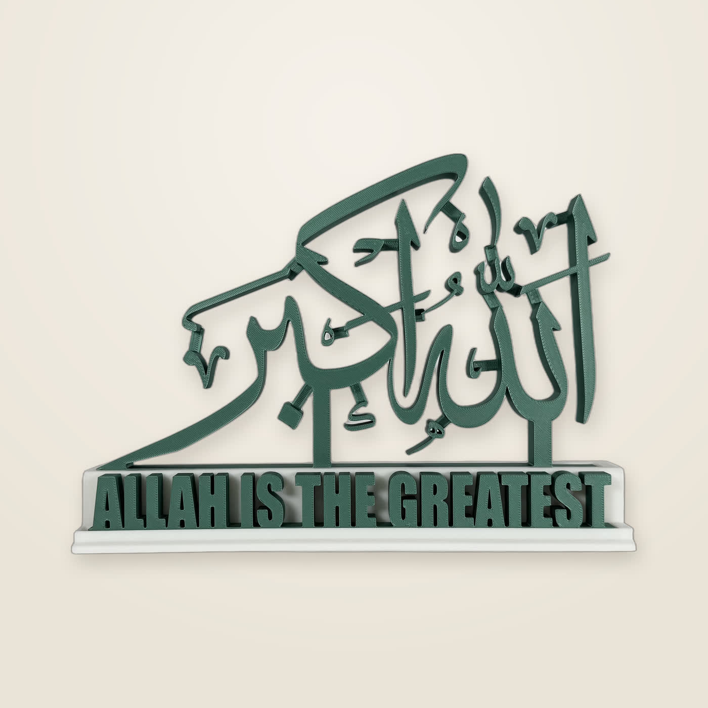 A free-standing Allahu Akbar calligraphy piece with its English bar